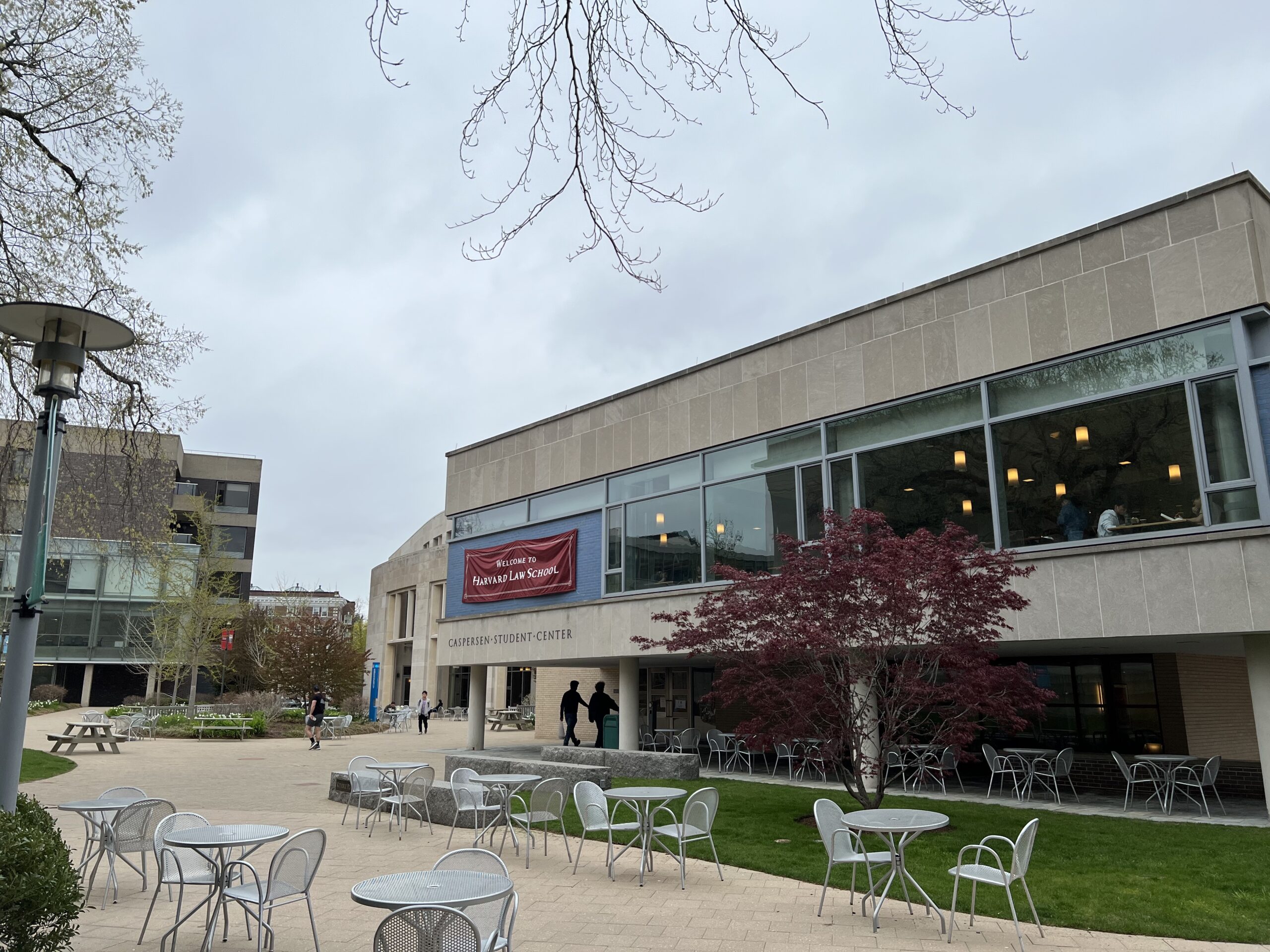 Picture of WCC. Banner on the building says "Welcome to Harvard Law School."