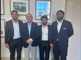 (From left to right) Hussain Awan, HLS '25, Justice Shah, Saeed Ahmad, J.D. '24, and Muhammad Hassan Ali, LLM '25 posing on the second floor of Wasserstein Hall.