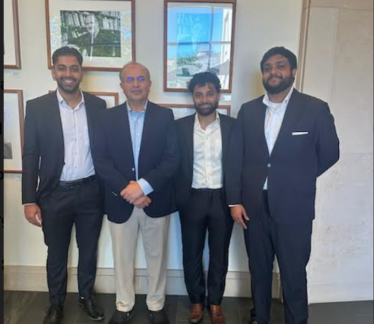 (From left to right) Hussain Awan, HLS '25, Justice Shah, Saeed Ahmad, J.D. '24, and Muhammad Hassan Ali, LLM '25 posing on the second floor of Wasserstein Hall.